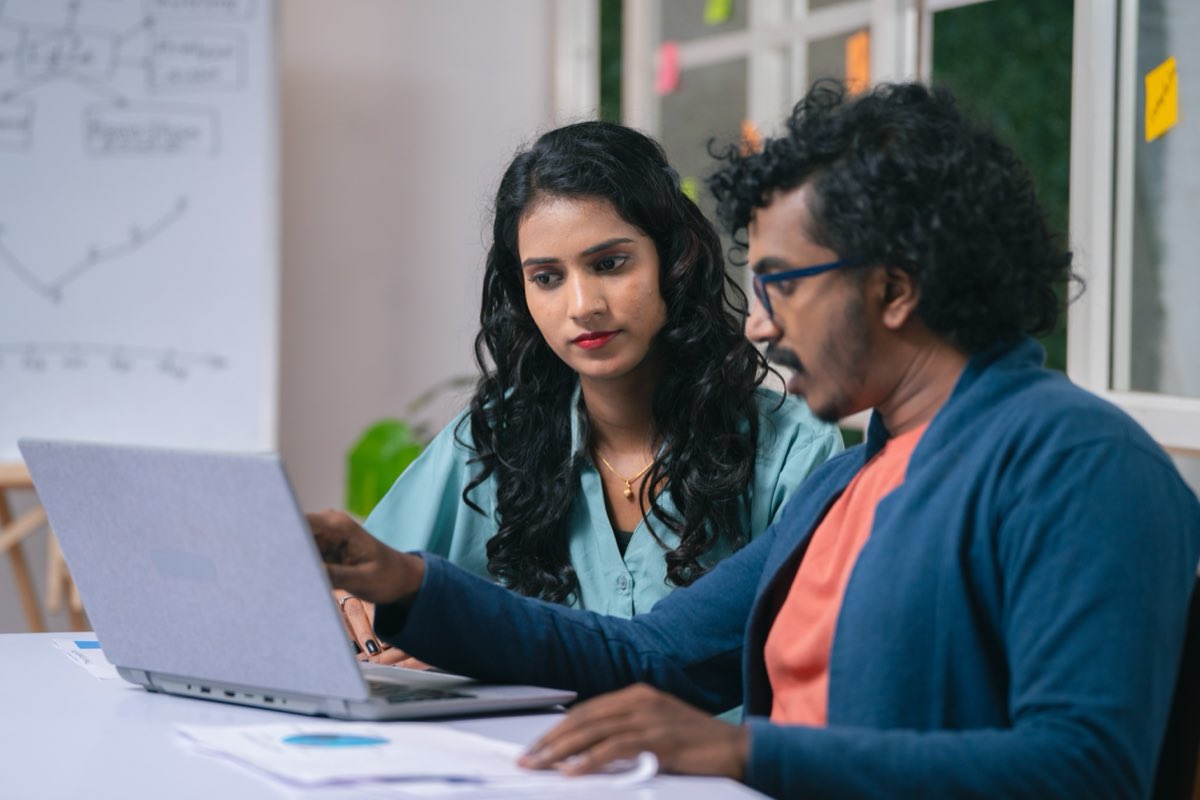Colleagues working together at an office in Bangalore