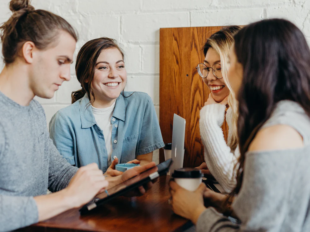 Friends talking over coffee